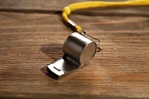 whistle on wood